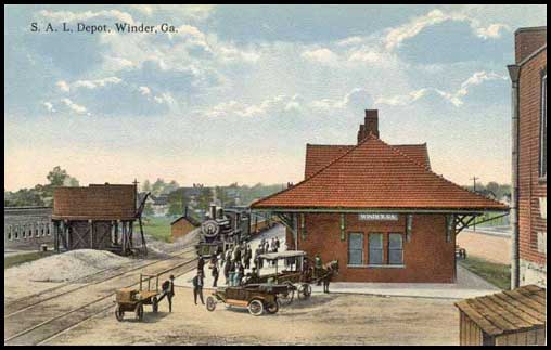 Old postcard view from east shows eastbound train